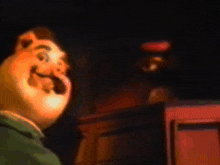 a close up of a cartoon character 's face with a mustache