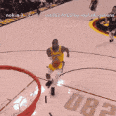 a basketball player with the number 6 on his jersey dunks a ball