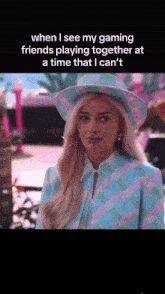 a woman wearing a hat and a suit says when i see my gaming friends playing together