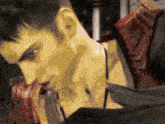a pixelated image of a man eating something