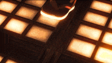 a glowing object is hanging from the ceiling