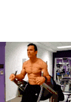 a shirtless man is standing on a machine in a gym