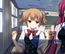 a girl in a school uniform with a red bow tie