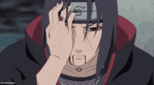 itachi uchiha is wearing a headband and covering his eyes with his hand .