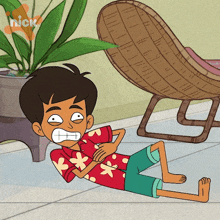 a cartoon of a boy laying on the floor with the nick logo on the bottom right