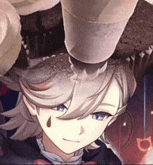 a close up of a person 's face with a tear in his eye
