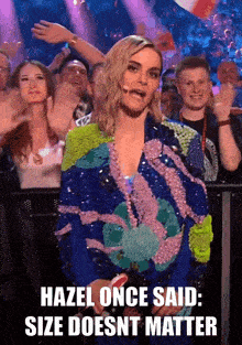 a woman stands in front of a crowd and says hazel once said size does nt matter