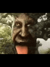 Wise Mystical Tree Tounge GIF - Wise Mystical Tree Tounge Laughing GIFs