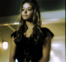 a blurry picture of a woman in a black dress