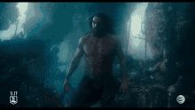 a man is swimming in the water with the date 11.17 on the bottom right