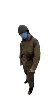 a man wearing a helmet and a face mask stands in front of a white background