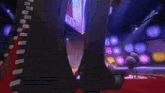 a person is standing on a red carpet with smoke coming out of the ground