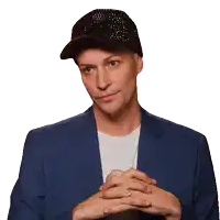 a man wearing a black hat and a blue suit