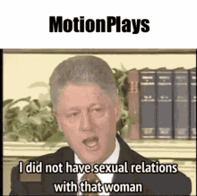 a man in a suit and tie is talking to a woman and says `` i did not have sexual relations with that woman '' .