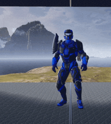 a man in a blue and black armor stands in front of a body of water