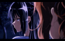 a girl with brown hair and yellow eyes looks at the camera