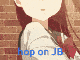 a girl with red hair is standing in front of a brick wall and says hop on jb