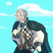 a man in a cape is standing in front of a blue sky with clouds .