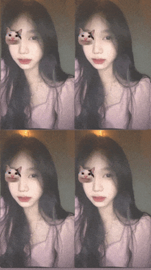 a girl with a cat sticker on her face looks at the camera