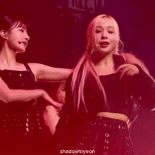 a group of women are dancing on a stage and the name shadowsyeon is on the bottom right corner