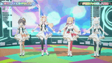 a group of anime girls are dancing in front of a sign that says " 絶対 アイドル 辞 の ない で "