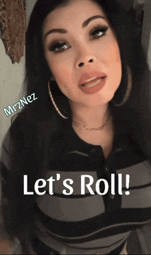 a woman says let 's roll in front of a picture of her