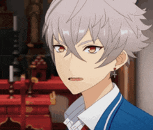 a boy with gray hair and red eyes is wearing a blue jacket and white shirt