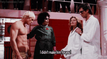 a group of people standing next to each other with one saying " i didn 't make him for you "