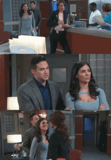 a man and a woman are standing next to each other in a hospital