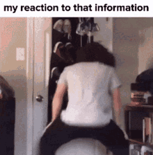 a person is sitting on a white ball in a room with a caption that says my reaction to that information