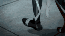 a black and white photo of a person 's leg