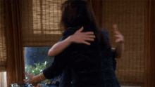 Hug Christy GIF - Hug Christy Anna Faris GIFs