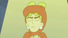 a cartoon character is wearing a frog costume and making a face
