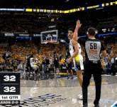 a basketball player with the number 58 on the back of his shirt