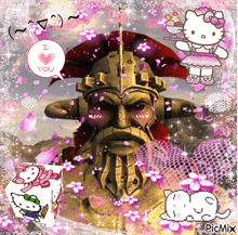 a picture of a statue with a hello kitty and i love you speech bubble