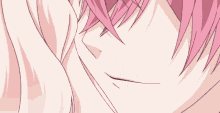 a close up of a person 's face with pink hair and teeth