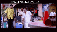 a group of men standing in front of a store that says starttamilchat