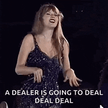 a woman in a black dress is singing into a microphone while a dealer is going to deal deal .