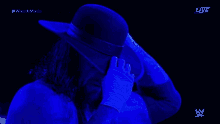 The Undertaker Wrestle Mania GIF - The Undertaker Wrestle Mania Hats Off GIFs