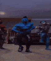 a group of video game characters are dancing together .