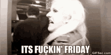 a black and white photo of a woman screaming it 's fuckin ' friday .