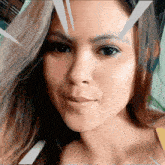 a close up of a woman with long hair