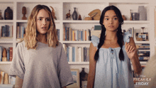 a poster for freakier friday shows two girls standing in a living room