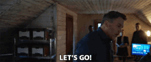 a man is saying let 's go in a room