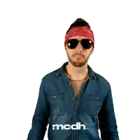 a man wearing sunglasses and a bandana with the word mcdh on the bottom right