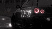 a car with the word hap written on the back