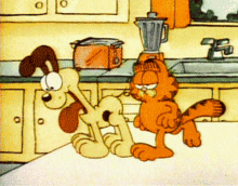 Odie Garfield GIF - Odie Garfield Kick GIFs