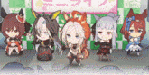 a group of anime characters are standing next to each other on a stage .