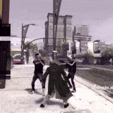 a video game shows a group of people standing on a sidewalk with a sign that says vlogg on it