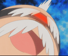 a close up of a cartoon character 's mouth with a red spot in the middle